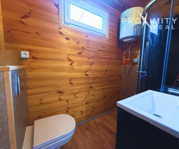 Záhrada s drevodomčekom v Nižnej Hutke