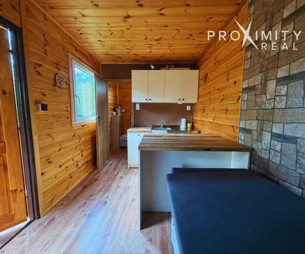 Záhrada s drevodomčekom v Nižnej Hutke