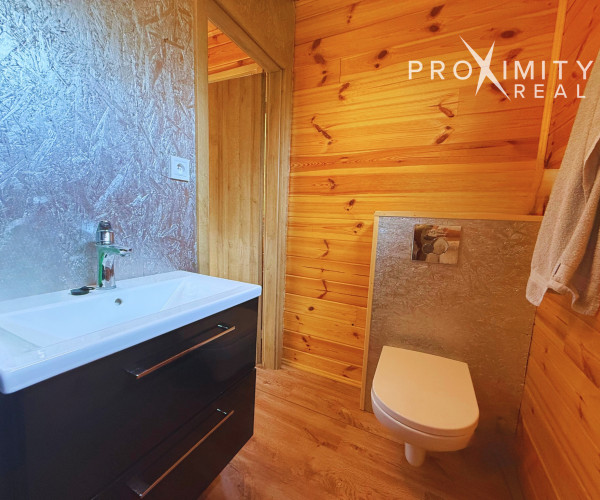 Záhrada s drevodomčekom v Nižnej Hutke